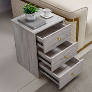 Modern 3-Drawer Side Table showcasing a premium grey finish with gold accents and three open drawers.