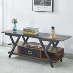 Wooden TV stand with books and decor items against a white wall.| Artisansa SA