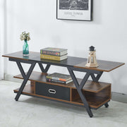 Wooden TV stand with books and decor items against a white wall.| Artisansa SA