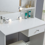 White Dressing Table with LED Mirror showcasing a modern design, elegant lighting, and beauty products arranged neatly.