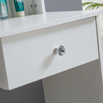 White Dressing Table with LED Mirror close-up of drawer handle and cosmetics.