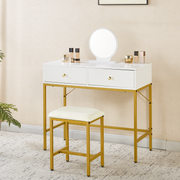 White dressing table set styled with cosmetics in a neutral bedroom