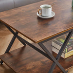 Adjustable foot pads and sturdy X-shaped metal frame on industrial coffee table