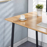 150cm office desk workstation featuring a wooden surface, cup, keyboard, and decorative plant.