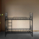 Black metal bunk bed against a textured beige wall.