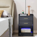 LED nightstand with drawers featuring USB LED lighting, two drawers, and stylish design beside a bed.