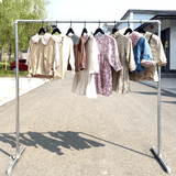 Double clothes rack CDR-02 with various garments outdoors on a sunny day | Artisansa SA