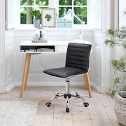 Adjustable bar stool set in a modern workspace with a stylish desk and natural light.