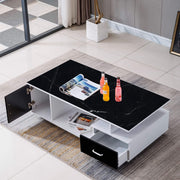 Modern coffee table with black marble top and white base in a living room setting. | Artisansa SA