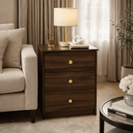 Modern 3-Drawer Nightstand with Gold Handles beside a sofa, featuring a lamp and stylish decor.