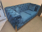 Velvet Chesterfield Sofa in a vibrant blue color with deep button tufting, ideal for stylish living rooms.