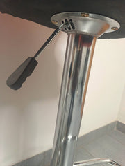 Close-up of the adjustable height mechanism of Retro Style Bar Chairs, showcasing sturdy chrome and black material.