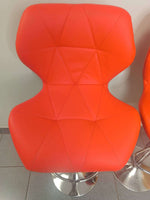 Retro Style Bar Chairs in vibrant orange, showcasing modern design and excellent condition.
