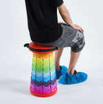 Person using retractable telescopic foot stool KJ-01 colourful step stool with plain background | Artisansa SA