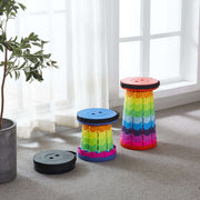 Retractable telescopic foot stool KJ-01 colourful folding stools on carpeted floor with plant and window background | Artisansa SA