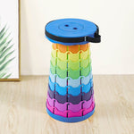 Retractable telescopic foot stool KJ-01 colourful folding stool on wooden floor with light background | Artisansa SA