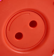 Close-up of red plastic component with two circular holes - retractable telescopic foot stool KJ-01 part | Artisansa SA