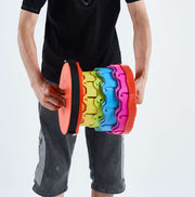 Person holding colourful resistance band - retractable telescopic foot stool KJ-01 accessory | Artisansa SA