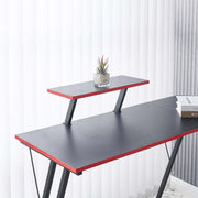 L-Shaped Desk with Monitor Shelf featuring a sleek design and modern aesthetics, showcasing a plant and books.