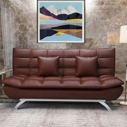 Stylish PU leather sleeper couch bed with tufted design and plush pillows in a modern living space.