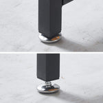 Height adjustable leveling feet on teak wood computer desk base