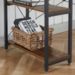 Wood computer desk side storage shelving with books and a woven basket.