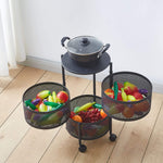 Black round storage trolley with rotating mesh baskets for home use