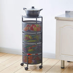 Black round storage trolley used as a kitchen fruit basket