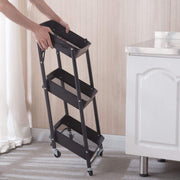 3-Tier Storage Cart being operated, showcasing its durable design and portability.