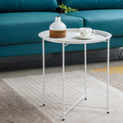 Stylish steel side table set in modern design with a white tray, plant, and cup, perfect for contemporary interiors.