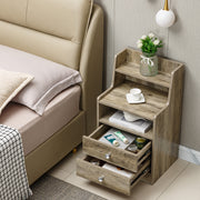 White Bedside Table with Drawers showcasing storage and modern design in a contemporary bedroom setting.