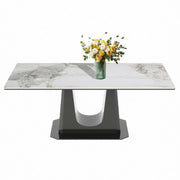 Rectangular marble dining table Q-03 with a stylish black U style leg and a vase of flowers on top.
