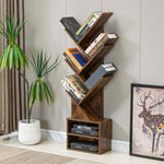 Freestanding Tree Bookshelf with Cabinet showcasing books in a modern, branch-like design, ideal for home decor.
