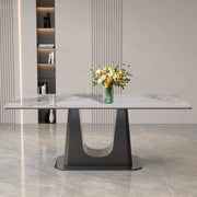 Rectangular marble dining table Q-03 with white marble top and black U style leg, decorated with flowers.