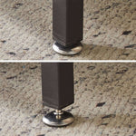 Close-up of adjustable feet on a TV stand with charging station, showcasing design stability and floor protection.