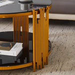 Round Glass Coffee Table featuring a gold geometric frame and black tempered glass top.