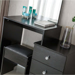 Artisansa black dressing table with mirror and stool in a room | Artisansa SA
