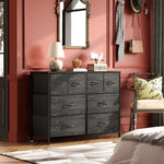 Fabric 8-Drawer Storage in a stylish living room setting with lamp and mirror, showcasing versatile storage solutions.
