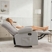 Woman relaxing in a Corduroy Recliner Chair with cup holders in a stylish living room.