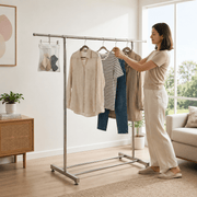 Double Rail Retractable Clothes Rack in use for efficient drying and storage in modern living space.