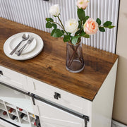 Farmhouse Wine Bar Cabinet with rustic wood top, white finish, decorative flowers, and dining plates.