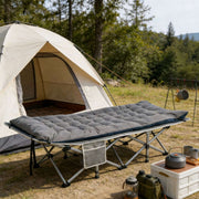 Durable folding camping cot with mattress for solo outdoor camping trip