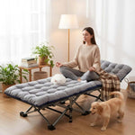 Comfortable folding camping cot with mattress used as temporary guest bed