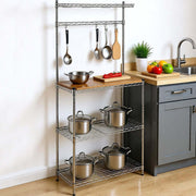 Heavy-Duty Baker's Rack with wood top, featuring pots, utensils, and kitchen organization elements.