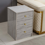 Modern 3-Drawer Nightstand with Gold Handles featuring minimalist Nordic design in a contemporary space.