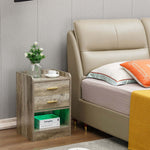 Modern LED Pedestal with Open Shelf beside a bed, featuring a subtle wood-grain finish and decorative items.