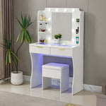 LED Dressing Table with Mirror featuring a charging station, illuminated vanity mirror, and stool in a stylish bedroom setting.