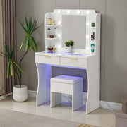 LED Dressing Table with Mirror featuring a charging station, illuminated vanity mirror, and stool in a stylish bedroom setting.