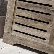 Close-up of the Rustic Storage Trunk Shoe Bench showing the slatted design and rustic wood finish.