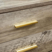 Close-up of modern drawer handles on a wood-grain surface, complementing the Modern LED Pedestal design.
